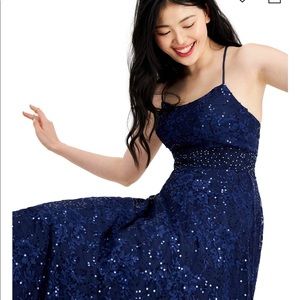 Prom Dress.Lacy sequin shimmer gown with glimmering beads at the waistline